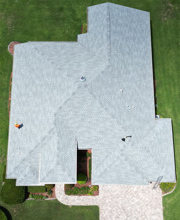 Aerial view of light-colored roof before GreenSoy rejuvenation treatment